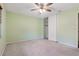 Bright bedroom with ceiling fan and closet at 8 Escondido Cir # 78, Altamonte Springs, FL 32701