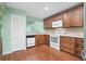 Modern kitchen with dark wood cabinets and stainless steel appliances at 8 Escondido Cir # 78, Altamonte Springs, FL 32701