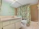 Full bathroom with tub shower and updated vanity at 8 Escondido Cir # 78, Altamonte Springs, FL 32701