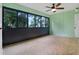 Sunroom with tiled floors and ceiling fan at 8 Escondido Cir # 78, Altamonte Springs, FL 32701