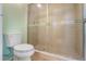 Clean bathroom with a toilet and a glass-enclosed shower at 8 Escondido Cir # 78, Altamonte Springs, FL 32701