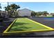 Green bocce ball court with yellow border at 8 Escondido Cir # 78, Altamonte Springs, FL 32701