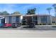 Front view of a two-story building with parking in front at 8 Escondido Cir # 78, Altamonte Springs, FL 32701