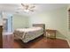 Bright bedroom featuring wood flooring and a ceiling fan at 8 Escondido Cir # 78, Altamonte Springs, FL 32701