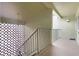 Stairwell with an open-air design and access to the outside at 8 Escondido Cir # 78, Altamonte Springs, FL 32701
