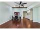 Spacious dining area featuring hardwood floors and a view of the kitchen at 8 Escondido Cir # 78, Altamonte Springs, FL 32701