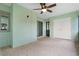 Sunroom with tiled floors and ceiling fan at 8 Escondido Cir # 78, Altamonte Springs, FL 32701