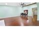 Light and airy dining area with wood flooring and kitchen access at 8 Escondido Cir # 78, Altamonte Springs, FL 32701