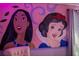 Wall mural featuring Pocahontas and Snow White at 4546 Narrative Ln, Kissimmee, FL 34746