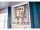 Mickey Mouse art print adorns the wall of this living room at 4546 Narrative Ln, Kissimmee, FL 34746