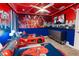 Spiderman themed bedroom with twin beds and mural at 4546 Narrative Ln, Kissimmee, FL 34746