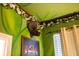Themed bedroom with Jurassic Park decor and a Triceratops head at 4546 Narrative Ln, Kissimmee, FL 34746