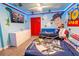 Toy Story themed bedroom with twin beds and mural at 4546 Narrative Ln, Kissimmee, FL 34746