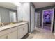 Double vanity bathroom with access to a Snow White themed bedroom at 4546 Narrative Ln, Kissimmee, FL 34746