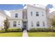 Modern two-story home with clean lines and stylish exterior at 4546 Narrative Ln, Kissimmee, FL 34746