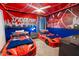 Themed bedroom with Spiderman decor and twin beds at 4546 Narrative Ln, Kissimmee, FL 34746