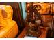 Ornate table lamp on wooden nightstand at 4546 Narrative Ln, Kissimmee, FL 34746