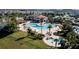 Resort-style pool with multiple areas for swimming and relaxing in a community setting at 4546 Narrative Ln, Kissimmee, FL 34746
