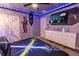 Star Wars themed bedroom with a comfortable bed and dresser at 4546 Narrative Ln, Kissimmee, FL 34746