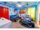 Toy Story-themed bedroom with twin beds and custom murals at 4546 Narrative Ln, Kissimmee, FL 34746