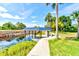 Side view of covered boat dock and walkway at 3202 Misty Morn Ct, St Cloud, FL 34771