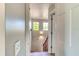 Upstairs hallway with two windows and access to bedrooms at 3202 Misty Morn Ct, St Cloud, FL 34771