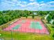 Aerial view of tennis and pickleball courts at 3202 Misty Morn Ct, St Cloud, FL 34771