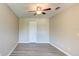 Spacious bedroom with light walls and wood-look flooring at 3202 Misty Morn Ct, St Cloud, FL 34771