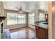Kitchen with wood cabinets, stainless steel appliances, and a breakfast bar at 3202 Misty Morn Ct, St Cloud, FL 34771