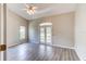 Bright bedroom with vaulted ceiling, wood flooring and French doors at 3202 Misty Morn Ct, St Cloud, FL 34771