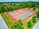 Aerial view of tennis and pickleball courts at 3202 Misty Morn Ct, St Cloud, FL 34771
