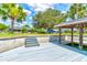 Steps leading to covered boat dock and waterfront views at 3202 Misty Morn Ct, St Cloud, FL 34771