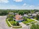 Single-Gathering home with tile roof and a two-car garage, nestled in a neighborhood at 9226 Longfellow Pl, Apopka, FL 32703
