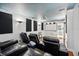 Home theater with seating for multiple viewers and projector at 9226 Longfellow Pl, Apopka, FL 32703