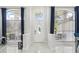 Bright and airy entryway with white door and large windows at 9226 Longfellow Pl, Apopka, FL 32703