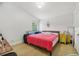 Main bedroom with king bed, and yellow nightstand at 9226 Longfellow Pl, Apopka, FL 32703