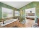 Bathroom with garden tub, shower, and view to bedroom at 9226 Longfellow Pl, Apopka, FL 32703