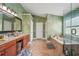 Elegant bathroom with double vanity, soaking tub, and shower at 9226 Longfellow Pl, Apopka, FL 32703