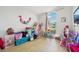 Playroom with toys and large window at 9226 Longfellow Pl, Apopka, FL 32703