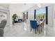 Open concept living and dining area with marble flooring at 9226 Longfellow Pl, Apopka, FL 32703
