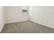 Simple bedroom with grey carpet and window at 2012 Rosewood Dr, Bartow, FL 33830