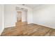 Empty hallway with wood-look tile flooring at 2012 Rosewood Dr, Bartow, FL 33830