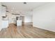 Open concept kitchen with white cabinets and tile flooring at 2012 Rosewood Dr, Bartow, FL 33830