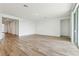 Open concept living room with tile flooring and kitchen views at 2012 Rosewood Dr, Bartow, FL 33830