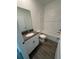 Bathroom with single vanity and a bathtub at 2927 Camden Way, Davenport, FL 33837