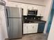Modern kitchen with stainless steel appliances at 2927 Camden Way, Davenport, FL 33837