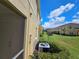 View of the backyards of townhouses and AC unit at 5434 River Rock Rd, Lakeland, FL 33809