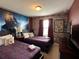 Bedroom with two twin beds, Harry Potter theme, and TV at 8940 Sydney Ave, Kissimmee, FL 34747