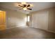 Bright bedroom with ceiling fan, window, and double-door closet at 2119 Willow Brick Rd, Windermere, FL 34786