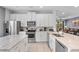 Eat-in kitchen with stainless steel appliances and ample counter space at 7481 Marker Ave, Kissimmee, FL 34747